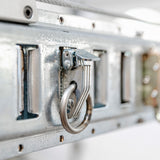 O ring anchor featured on garage storage track, designed for strong and secure attachment points.