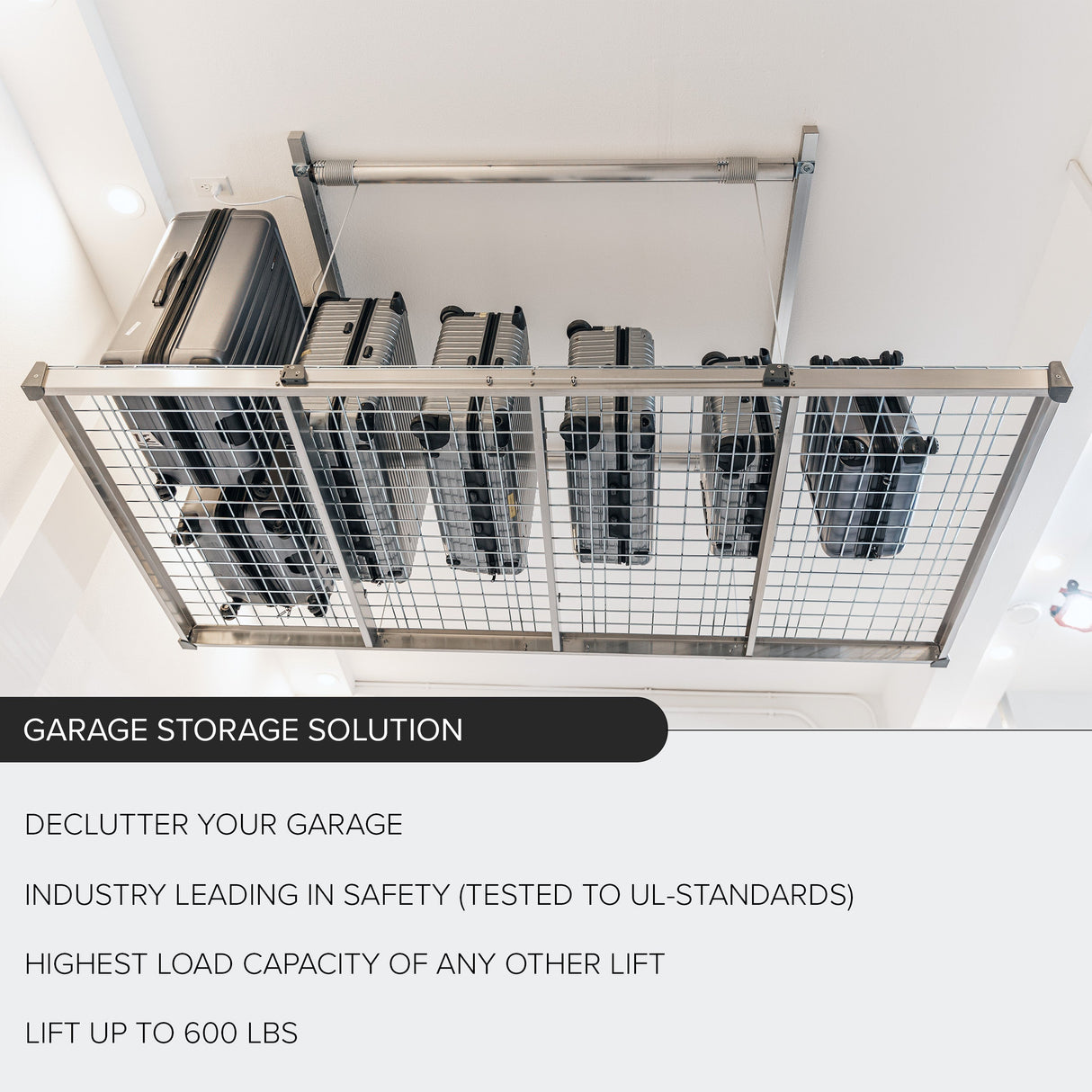 Overhead garage storage platform holding multiple suitcases neatly organized.