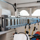Close-up of a setup with a bike lift for the garage, highlighting secure and organized storage for a motorbike.
